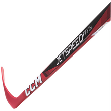 Load image into Gallery viewer, CCM Hockey Sticks CCM JetSpeed FT7 Grip (2024) Youth Red/Black diagonal side stick close-up with blade pointing to the upper-left