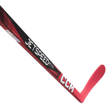 Load image into Gallery viewer, CCM Hockey Sticks CCM JetSpeed FT7 Grip (2024) Youth Red/Black diagonal side with blade pointing to the upper-right