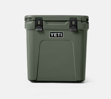 Load image into Gallery viewer, close up front view camp green YETI Roadie 48 Wheeled Cooler
