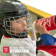 Load image into Gallery viewer, picture of young hockey playing drinking BioSteel out of BioSteel Spouted Team Water Bottle

