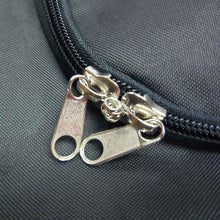 Load image into Gallery viewer, Close up picture of the # 10 lockable zipper on the Lowry Duffle Equipment Bag, Black (LDB38)
