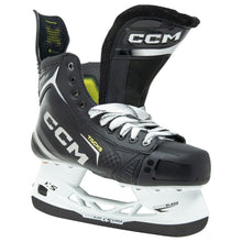 Load image into Gallery viewer, CCM Hockey Skates CCM Tacks Vector Premier Source Exclusive (2024) Intermediate front side pointing right with tongue out
