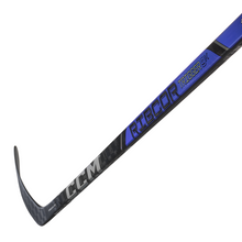 Load image into Gallery viewer, CCM Hockey Sticks CCM Ribcor Trigger 9K (2024) Junior Black/Blue/Purple close-up of diagonal shaft with blade pointing to the upper-left
