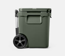 Load image into Gallery viewer, side view camp green YETI Roadie 60 Wheeled Cooler

