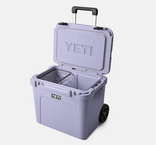 Load image into Gallery viewer, open front view cosmic lilac YETI Roadie 60 Wheeled Cooler
