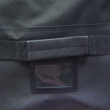 Load image into Gallery viewer, Close up picture of the end handle and name/number compartment on the Lowry Duffle Equipment Bag, Black (LDB38)
