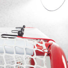 Load image into Gallery viewer, Picture of the Snipers Edge Hockey Ultimate Goalie Shooter Tutor attaching to a net
