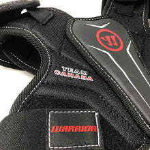 Load image into Gallery viewer, Warrior Team Canada Lacrosse Shoulder Pads (Youth) close up of chest and strap

